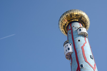Osaka, Japan - March 28th, The public facility of the Osaka City Office possession, Incineration plant with smokestack against blue skyのeditorial素材