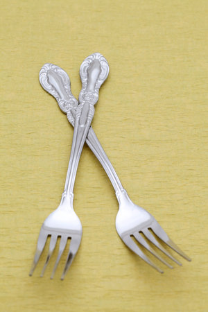 silver forks on table