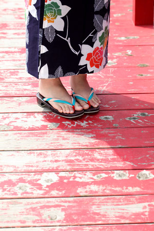 Legs of young woman in Japanese kimono style の写真素材