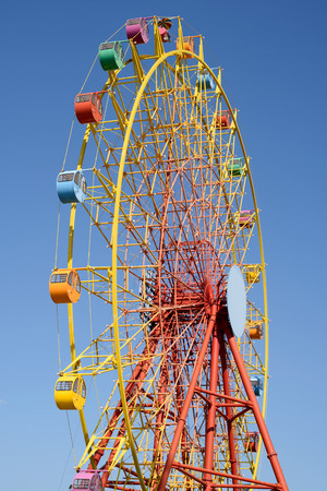 Ferris wheel against a clear blue skyの写真素材