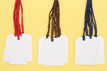 Blank tag on yellow backgroundの写真素材