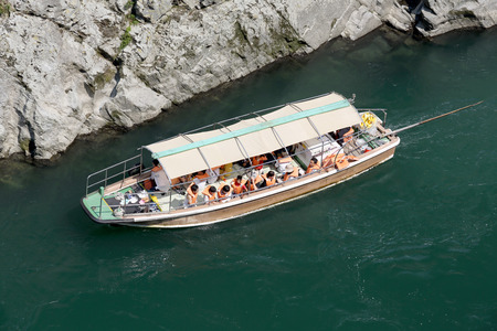 TOKUSIMA, JAPAN-August 02: The tourist wooden ship of the Yosino-river cruise in Miyosi, Tokusima, Japan on Aug 02, 2015のeditorial素材
