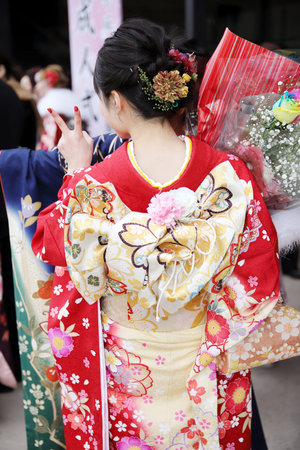 KAGAWA, JAPAN-JANUARY 7, 2018: Young Japanese woman wearing traditional kimono for the coming of age day celebration, they turn twenty in Kagawa, Japan.のeditorial素材