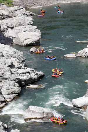 KOBOKE, TOKUSIMA, JAPAN - AUGUST 14, 2018: Water rafting on the rapids of river Yosino on August 6, 2018 in Koboke Canyon, Japan. Yosino River is one of the most popular among rafters in Japan.のeditorial素材