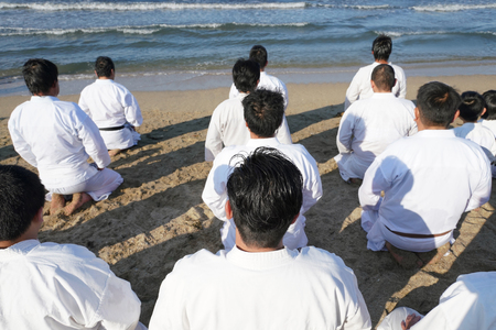 Japanese karate martial arts, spiritual sitting at the beachの写真素材