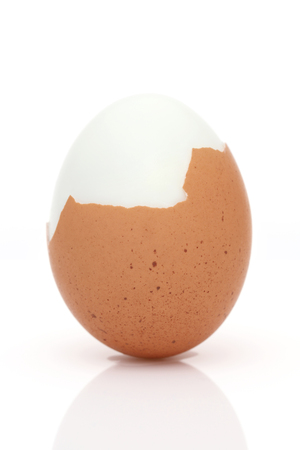 Boiled egg on a white background, in a studio shotの写真素材