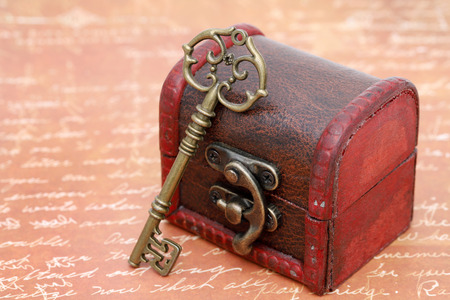 vintage key and old treasure chest on letterの写真素材