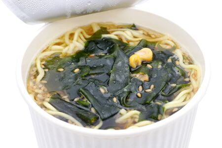 Instant noodles in cup isolated on white backgroundの写真素材