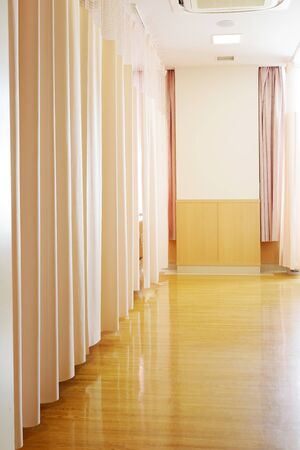 Hospital room with privacy medical curtain in a hospitalの写真素材