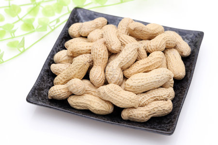 Organic peanuts in shell in a dish