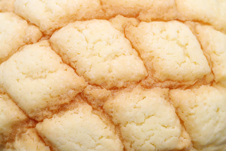 Close up of Japanese meronpan bread texture backgroundの写真素材