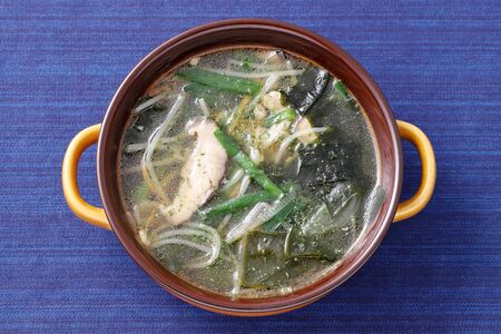 vegetable with pork soup in a dish on tableの写真素材