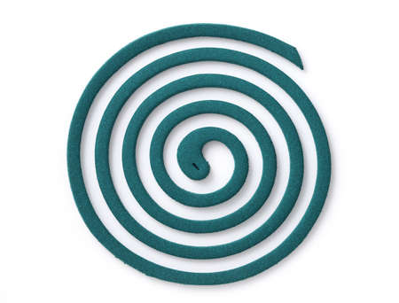 Classic green mosquito coil isolated on white backgroundの写真素材