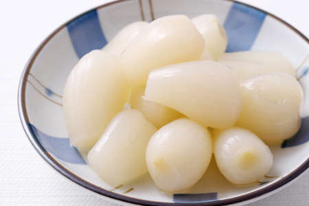 Japanese Rakkyo, Sweet and sour pickled scallions in a dishの写真素材
