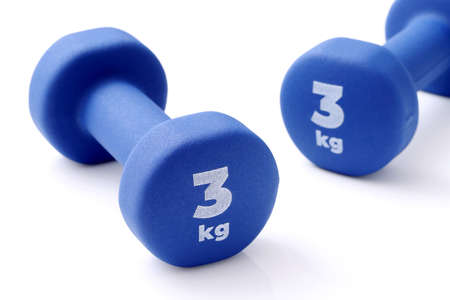 Two pairs of blue fitness dumbbells on a white background, Concept healthy lifestyle, sport and diet. Sport equipment.の写真素材