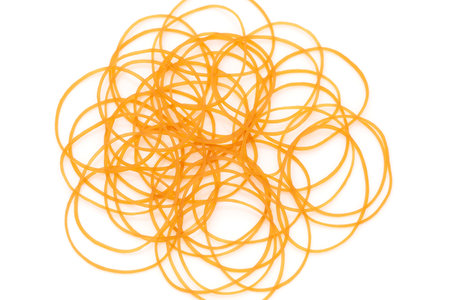 stack of brown rubber bands isolated on white background