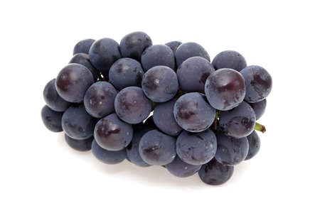 bunch of ripe purple grapes isolated on white backgroundの写真素材
