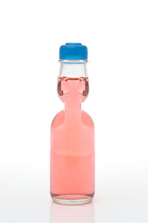 Japanese soda drink Ramune in a bottle on white backgroundの写真素材