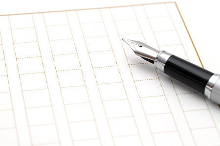 Fountain pen with Japanese manuscript paper backgroundãの写真素材