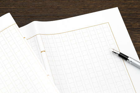 Japanese manuscript paper with fountain pen, Genko yoshi on wooden tableの写真素材
