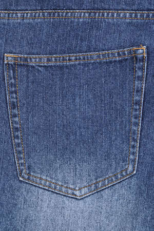 blue jeans with back pocket as background, closeupの写真素材