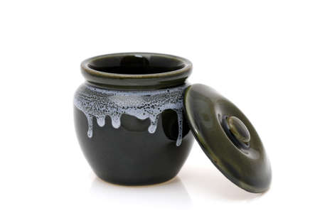 Japanese traditional clay pot with lid on white backgroundの写真素材
