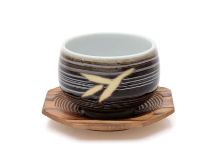 closeup view of ceramic cup for tea on white backgroundの写真素材