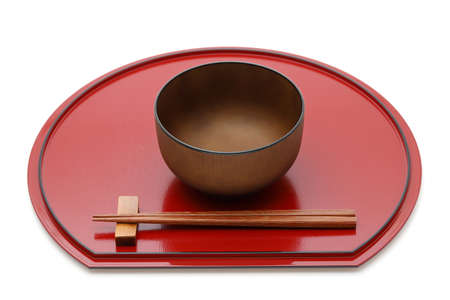 Miso soup bowl with chopsticks on tray, Traditional tableware of Japan.の写真素材