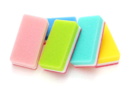 color rectangular sponges for washing dishes and cleaning in kitchen on white backgroundの写真素材