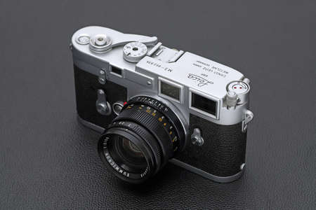 Kagawa, Japan - February 27, 2022: Leica M3 rangefinder camera with Leitz 50mm f2 Summicron M-mount lens. Vintage collectible classic lens concept.のeditorial素材