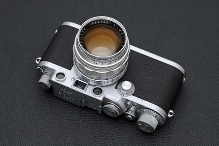 Kagawa, Japan - February 27, 2022: Leica â¢F rangefinder camera with Leitz 50mm f1.4 Summilux L-mount lens. Vintage collectible classic lens concept.のeditorial素材