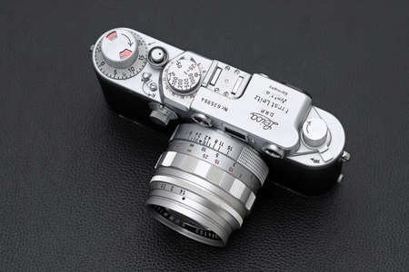 Kagawa, Japan - February 27, 2022: Leica â¢F rangefinder camera with Leitz 50mm f1.4 Summilux L-mount lens. Vintage collectible classic lens concept.のeditorial素材