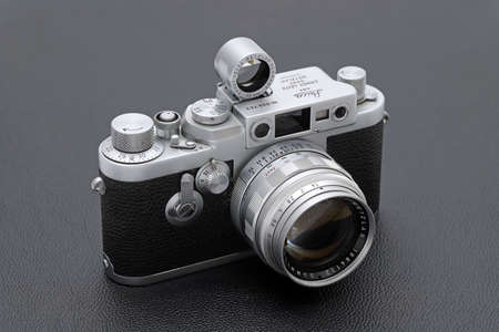 Kagawa, Japan - February 27, 2022: Leica â¢G rangefinder camera with Leitz 50mm f1.4 Summilux L-mount lens. Vintage collectible classic lens concept.のeditorial素材