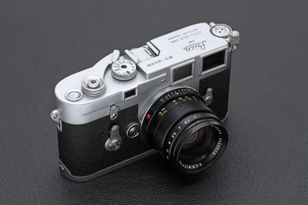 Kagawa, Japan - February 27, 2022: Leica M3 rangefinder camera with Leitz 50mm f2 Summicron M-mount lens. Vintage collectible classic lens concept.のeditorial素材