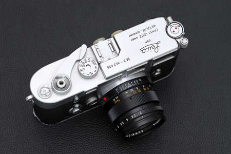 Kagawa, Japan - February 27, 2022: Leica M3 rangefinder camera with Leitz 50mm f2 Summicron M-mount lens. Vintage collectible classic lens concept.のeditorial素材