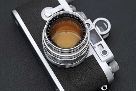 Kagawa, Japan - February 27, 2022: Leica â¢G rangefinder camera with Leitz 50mm f1.4 Summilux L-mount lens. Vintage collectible classic lens concept.のeditorial素材