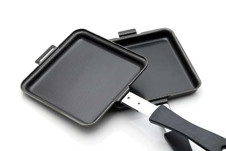 Press hot sandwich maker on white backgroundの写真素材