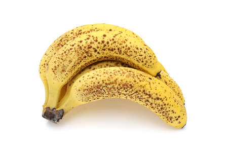 over-ripe bananas isolated on white backgroundの写真素材