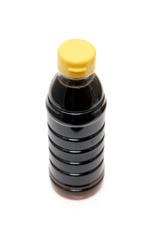 Plastic bottle of soy sauce on white backgroundの写真素材