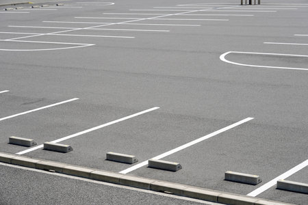 Road marking on the asphalted parking placeの写真素材
