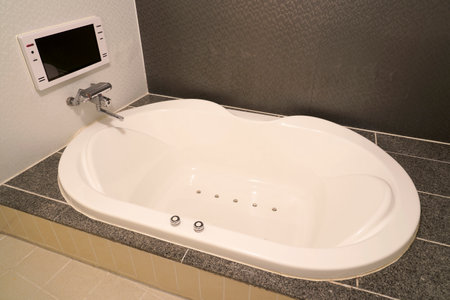 Japanese style bathroom image with brown tilesの写真素材