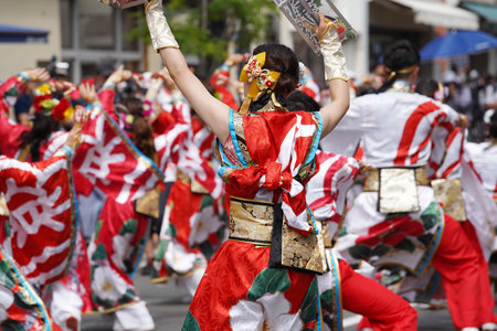 KAGAWA, JAPAN - JULY 15 2023: Japanese performers dancing in the famous Yosakoi Festival. Yosakoi is a unique style of Japanese dance event.のeditorial素材