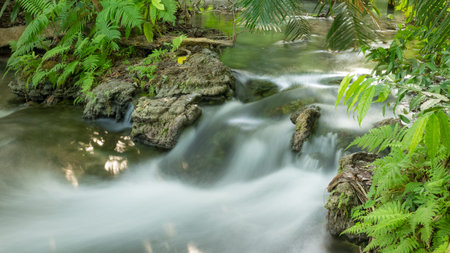 waterfall in Erawan Nationalpark deep forest on mountain.の写真素材