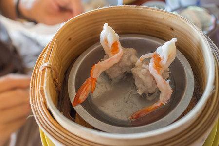 Dim Sum in Bamboo Trays by Local Street Food Vendorsの写真素材