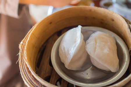 Dim Sum in Bamboo Trays by Local Street Food Vendorsの写真素材