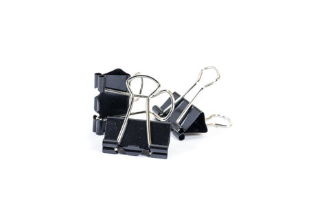 black paper clips on white isolate backgroundの写真素材