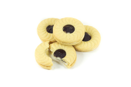 Butter cookies with blueberry jam isolated on a white backgroundの写真素材
