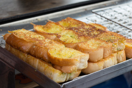 a breakfast with grilled bread toast and butter