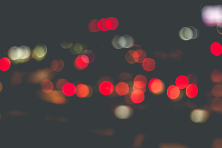 Blur image of lights during the nightcar light. vintage or retro color toned.の写真素材