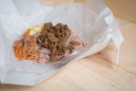 Rice Seasoned with Shrimp Paste khaao khlook gabpi which is important dish of Thai cuisine that serve with fried pork, omelet and dry shrimpsの写真素材
